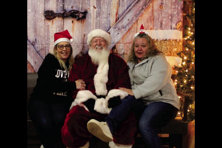 Joye Amaral and Kathryn Bain told Santa (Bill Cagle) what they’d like for Christmas and he thought it was hilarious. We’ll see if he brings what they asked for!