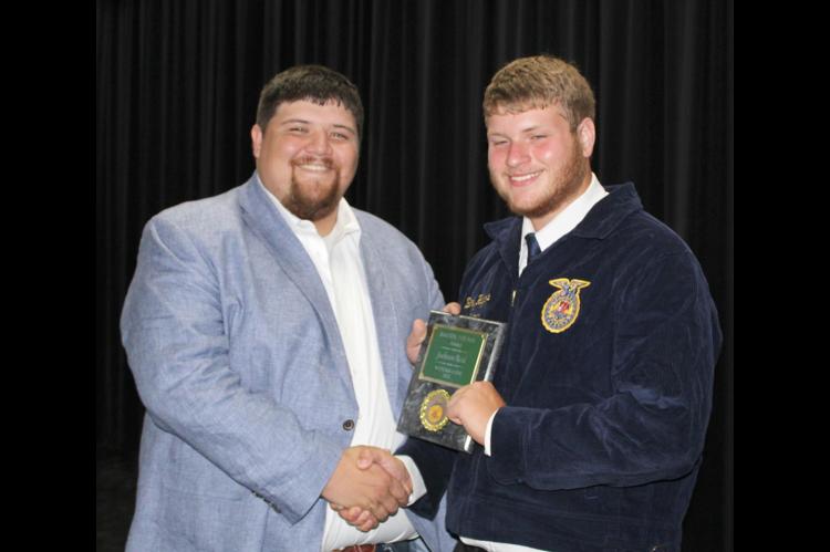 Wetumka FFA Awards given by FFA Instructor, Britton Putman