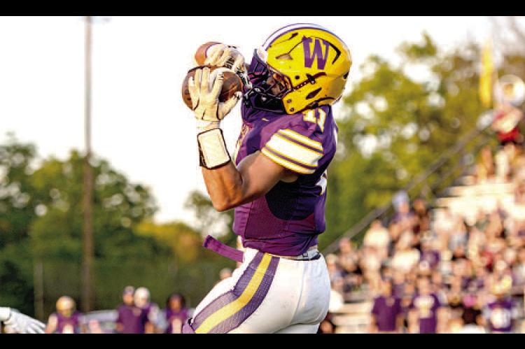 Noah Hare dives for the catch.