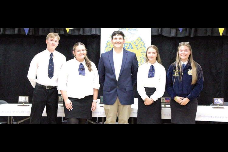 2025-2026 [FORMER] CALVIN FFA OFFICERS Left to Right: Landen Rippee (Treasurer), Terra Hart (President), Mr. Wyatt Munholland (FFA Chapter Advisor), Kaden Howell (Vice President), Sierra Ulmer (Sentinel)