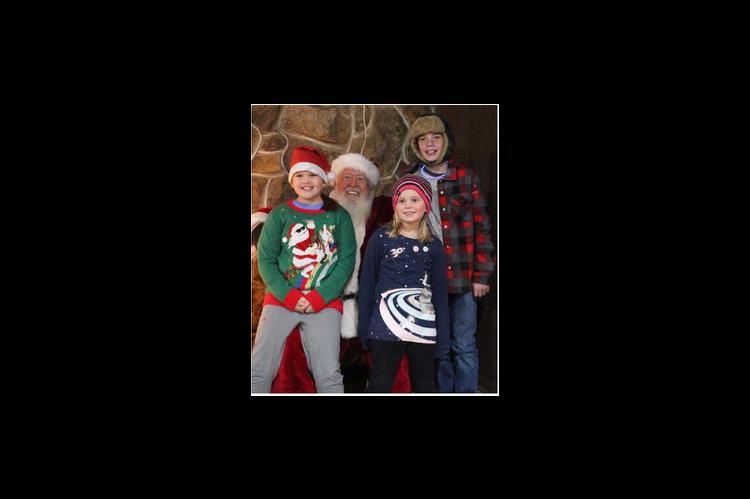 Anastasia, Jerrelin &amp; Matthew Turner were thrilled to see Santa Claus in Calvin this past week!