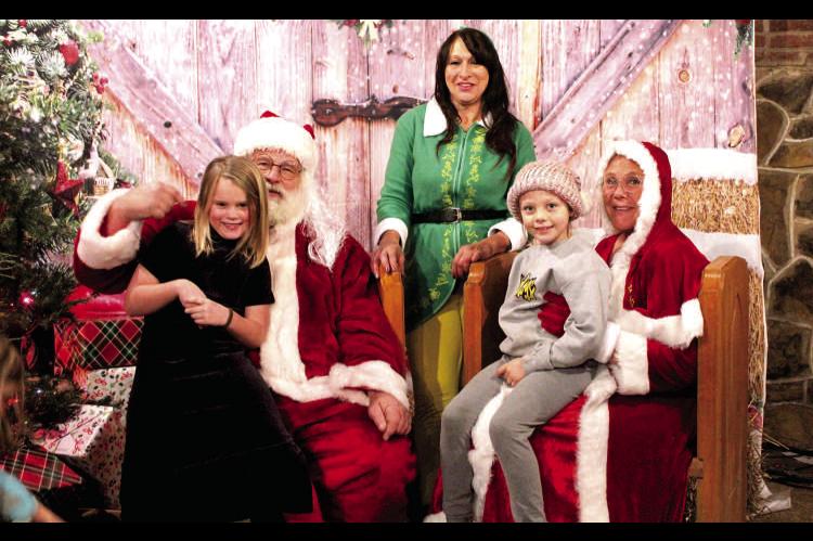 Jerrelin Turner and Grace Peloquin assured Santa and Mrs. Claus that they have been good all year and are certainly on his “nice list”. Santa was so kind to visit Calvin, OK early this year. Picture by Felisha Ring