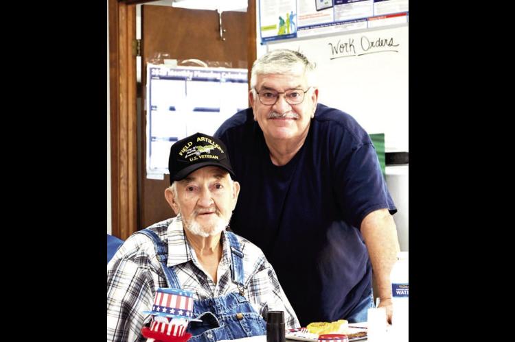 The Dustin Activities Commitee honored area veterans with a brunch on Thursday, November 6th at the Dustin City Hall. Pictured above are seated Raymond Summers and standing Jim Findley.