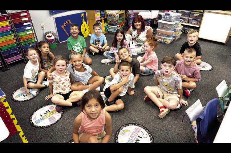 MEET MRS. LEE’S FIRST GRADE CLASS AT WETUMKA PUBLIC SCHOOLS! They are all excited to begin this school year. Pictured above are Alena Taylor, Nelly Robison, Jaliyah Obasi, Tate Glover, Ryker Puckett, Hattie Fixico, Baya Rhinehart, Hendrix Griffin, Madi Dilday, Trayden Goodwin, Coyote Yahola, Dexton Tucker, Lilith Simmons, Jere - miah Shivers, and Mrs. Jennifer Lee.