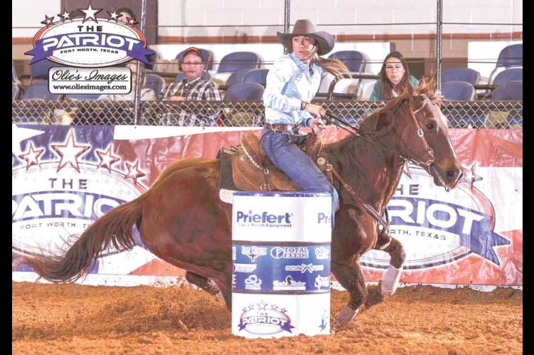 Faith Voigt participates in Patriot Open 4D Barrel Race