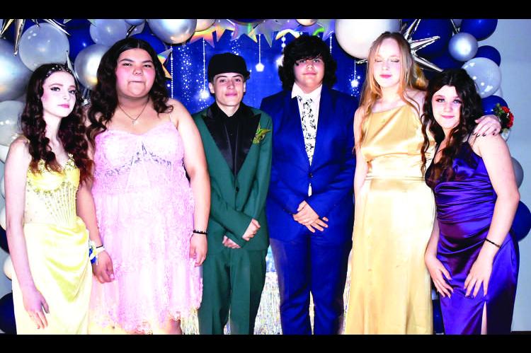 FRESHMEN. L to R: Peyton Henry, Sunjaya Lee, Aiden Watkins, Nathaniel Vannasdall, Gracie Purdom and Hayley Havens Prom was held on March 14th at the Riverhawk gym. The theme was A Night under the stars.