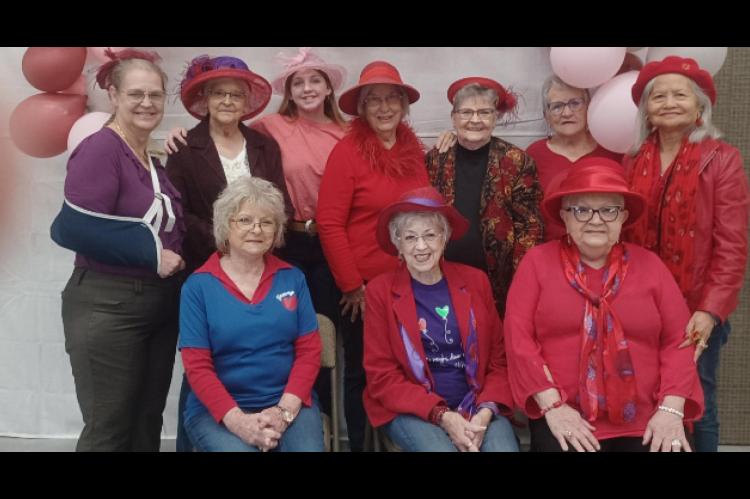 Red Hatters Royally Entertained by the Young at Heart Group