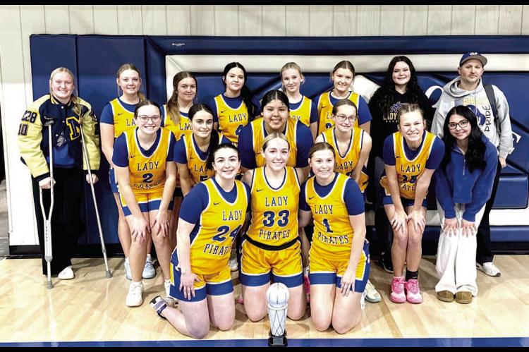 THE MOSS LADY PIRATES WIN THIRD IN THE BOWLEGS BASKETBALL TOURNAMENT. Pictured above (back row): Graycee Janes, Graclee Huff, Kinzlie Barbre, Kayla Priest, Kate Rogers, Faith Yarbrough, Josslynn Rollins, Head Coach Michael Freeman; Middle row: Sloane Van Haren, Tara Keesee, Leah Harjochee, Paycee Van Haren, Landri Mills, Bryleigh Jordan; Front row: Kara Mayfield, Elexis Stafford, Reese Harris. Picture Courtesy of Whitney Purkins