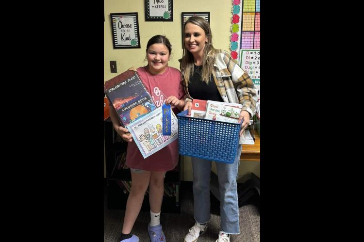 CALVIN STUDENT MARNI SHIEVER IS THE 1ST PLACE WINNER OF THE FARM BUREAU COLORING CONTEST.