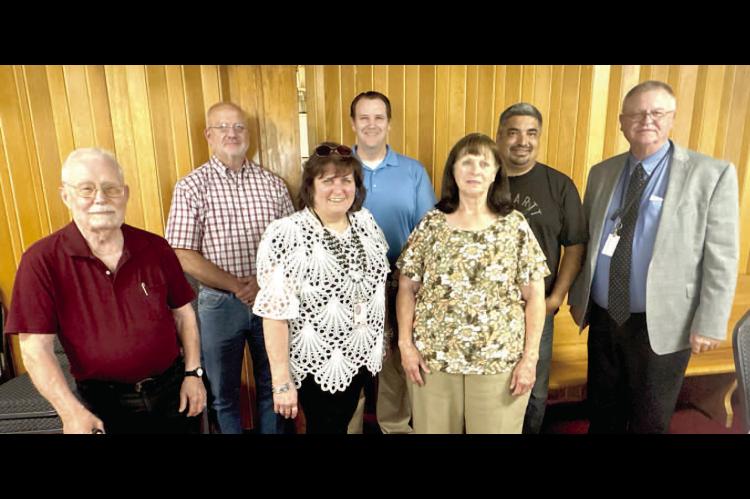 WETUMKA CHAMBER HOSTS MONTHLY LUNCHEON... Community leaders and guests gathered for a delicious lunch provided by Jesse Lopez and his new pizza venture. Pictured above are Chamber Board Members (L-R): Vernon Stout, Vic Woods, Donna Dyer, James Berry II, Debbie McDaniel, Jesse Lopez and Steve Stewart.
