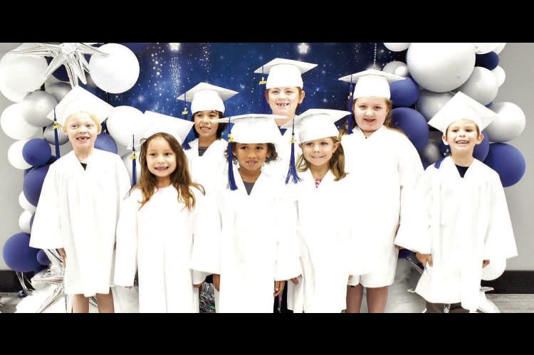 GRAHAM-DUSTIN KINDERGARTEN GRADUATES ARE FULL OF SMILES AS THEY MOVE FORWARD TO 1 ST GRADE. FRONT ROW: Lilliath Rodriguez, Zalaya Hampton, Charlotte Martin. B ACK ROW: Sage Williams, Kenai Waterdown, Jackson McKinney, Baylee Branum, Ryan Matthews. They graduated on May 8th at the school auditorium. Photo courtesy of Wanda Mankin.