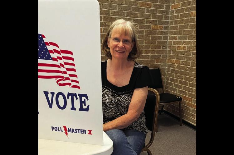 Margaret Johnson is shown casting her vote in the recent election.