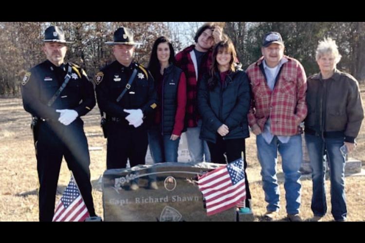 Officers from the McAlester Police Department along with family members of Captain Richard Parker gathered at Wetumka Cemetary recently to place a wreath on the hero's grave. Pictured above are (L-R): Master Patrolman Nick Mattioda, Sergeant Kevin Bishop,