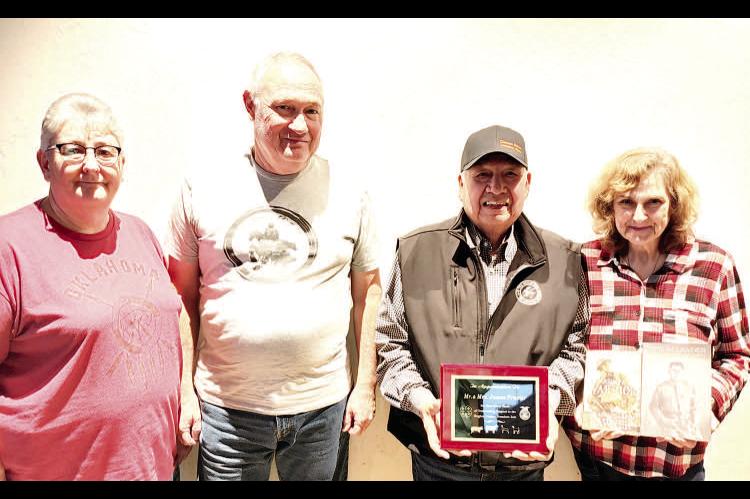 Choctaw Tribal Councilman District 12, Mr. James Frazier and his lively wife Vicki were presented with a plaque for their many years of support to the Hughes County Premium Sale. 2025 will be James and Vic- ki's final year to attend as he will be retiring