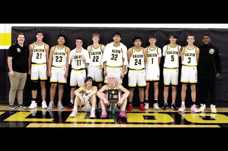 CALVIN BULLDOGS WIN DISTRICT TITLE... Pictured above are (L-R): (Back Row) Assistant Coach Trevin Pettigrew, Kaynan Ring, Josiah Bear, Caynen Jones, Landen Rippee, Geanny Carrillo, Damien Carrillo, Jaxton Winningham, Brandon Garner, Colton Guffey, Coach John Godwin; (Front Row): Timothy Allison, Braden Specht; (Not Pictured): Jordynn Harrison
