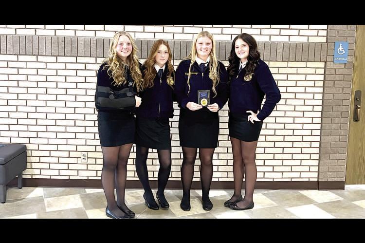 MOSS FRESHMEN FFA MEMBERS COMPETE AT REGIONAL GREENHAND QUIZ... The Moss FFA Chapter compet - ed at the Regional Greenhand Quiz on Tuesday, October 14th. Faith Yarbrough placed 5th Overall. Pictured left to right - Moss FFA Members Graclee Huff, Cennly Sn