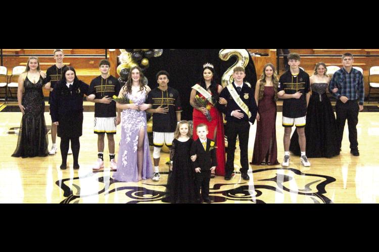 2025 CALVIN HOMECOMING COURT. Pictured above are (L-R): Sierra Ulmer, Jimmy Ayers, Caden White, Anderson Winningham, Jace Dickey, Queen Addison Woods, King Caleb Rocky, Kaden Howell, Braden Specht, Kayla Bain, and Wyatt Ulmer. Flower Girl Grace Peloquin, 