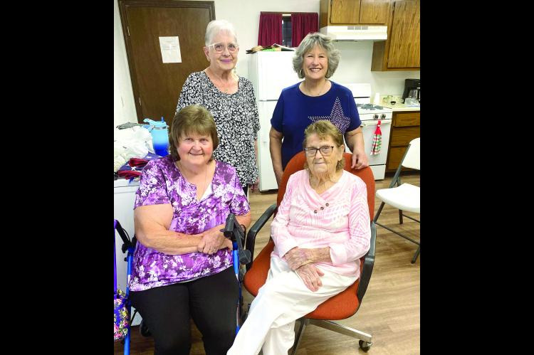 (seated) Joyce Lively, Wanda Frederick (standing) Jane Moore and Kathleen Harrington