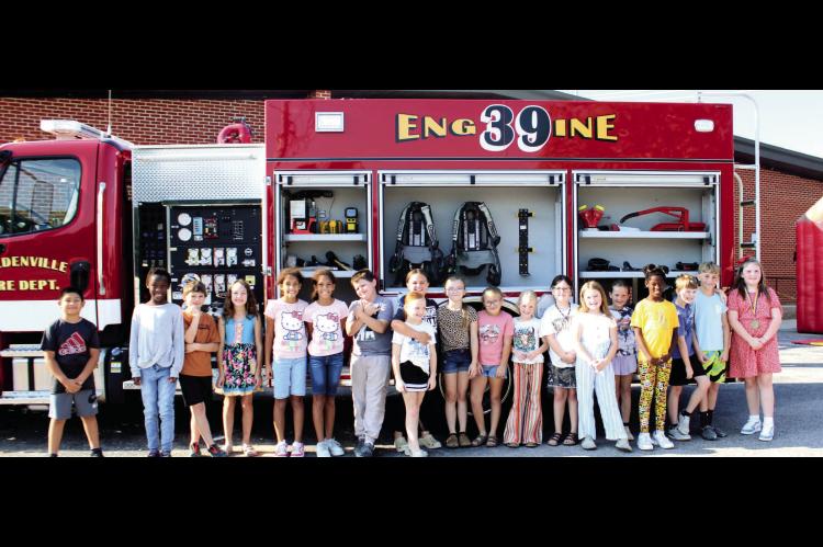 Holdenville Fire Department came to Moss Public Schools on Friday, October 3rd and did a Fire Prevention Presentation for the entire elementary school. The event was also sponsored by Farm Bureau Insurance, Jessica Beck, of Holdenville. Pictured above, le