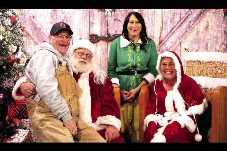 NEVER TOO OLD TO BELIEVE IN SANTA... Robert Carlton just shared his wish list with Santa. Santa was happy to see that Mr. Carlton is also an Oklahoma Sooner fan. Picture by Felisha Ring