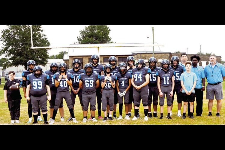 GRAHAM-DUSTIN RIVERHAWKS SET FOR SEASON WITH NEW MASCOT... Pictured above are: Front row: L to R: Deighton Corn, ball boy, Lexi Rhodes, Kurtis McCaslin, Wesley Parkhurst, Memphis Corn, Syrus Hicks, Keylee Palmer, Jackson Elliott, Rex Corn, ball boy. Back 
