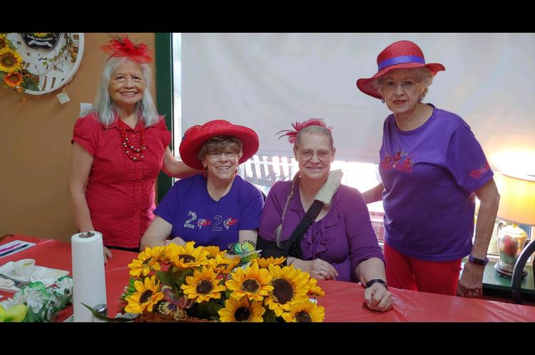 Red Hatters enjoy outing to The Farmer’s Daughters Marketrarely