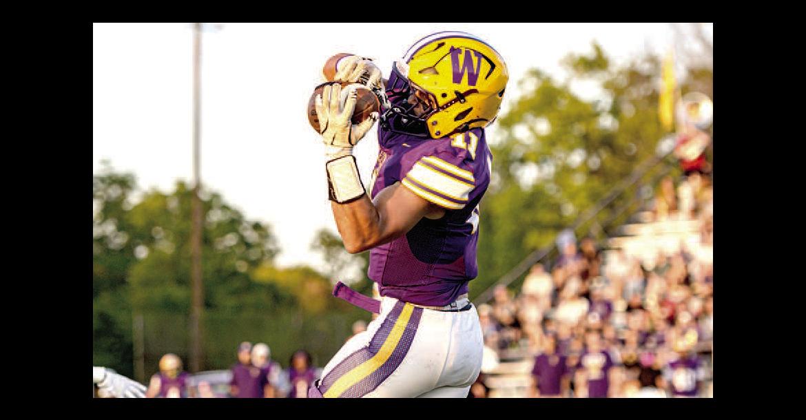 Noah Hare dives for the catch.