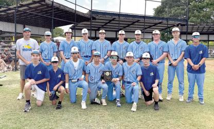 THE MOSS PIRATES BASEBALL TEAM BEAT CALERA IN THE TUPELO TOURNAMENT AND WERE CONSOLATION CHAMPIONS. Front row: Chance Brewer, Ryder Mudd, Gauge Lockhart, Levi Foster, Micah Wheeler, Tate Keesee, Brody Foster. Back row: Coach Michael Freeman, Jayden Priest, Garrett LaGrone, Jayden Hall, Easton Smith, Jackson O'Kelley, Landon Golden, Heston Nolen, Jameson O'Kelley, Coach Daxton Carter.