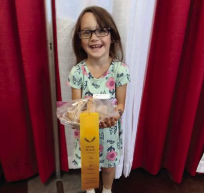 Sarah Pumphrey 4 years old of Horntown got 5th place out of 16 competitors in the junior division at the OKC fair! Her mother is Rebecca Kibby, and her grandparents are Wayne and Pam Kibby of Horntown.. We are so proud of Sarah. It is hard to place in the OKC fair com- petition and she placed her first time going!