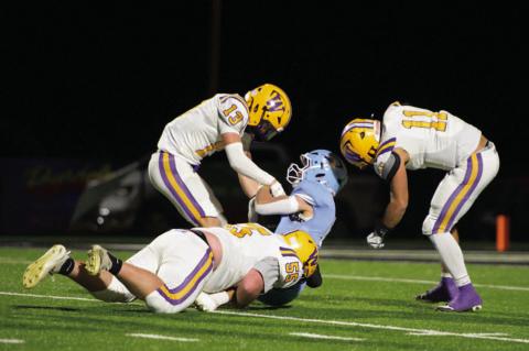 Bryant Sites (13), Noah Hair (11) both come in for the assist on the tackle by Daniel Cox (55).