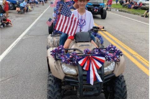 Calvin Celebrates 4th of July with Parade and Festivities