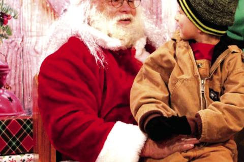 I DON’T CARE WHAT YOU HEARD, SANTA, I HAVE BEEN A GOOD BOY ALL YEAR...Asa Alexander tells Santa what he hopes to get for Christmas this year. The Town of Calvin hosted Santa and his elf at the Christmas parade this year. The Christmas story was read, fl
