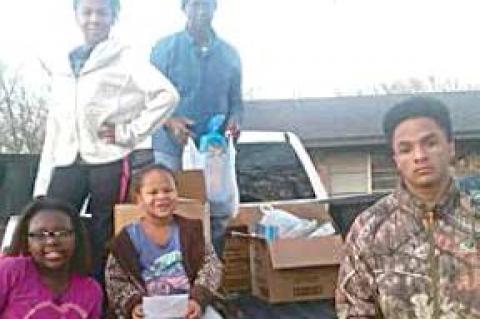 Dr. Claud and Elayne Evans Deliver Baskets