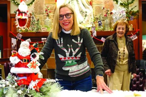 Seminole Nation Museum board president Barbara Butner and docent Phyllis Williamson man the refreshment table at the 2023 Holiday Bazaar. The Bazaar kicks off the holiday season in Wewoka and fills the museum with the Spirit of Christmas as the aroma of freshly made baked goods and sweets fills the air, lively carols and Christmas tunes ring throughout the building, and people crowd the galleries seeking perfect gifts to put under their trees, or that “just what I need” buy for themselves.