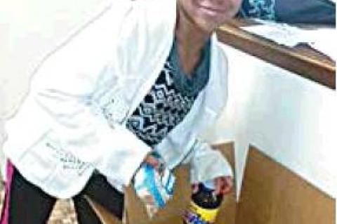 Dr. Claud and Elayne Evans Deliver Baskets