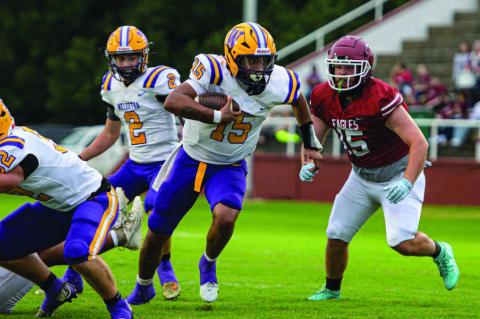 Quarterback Isaiah Drake with a quarterback keeper.