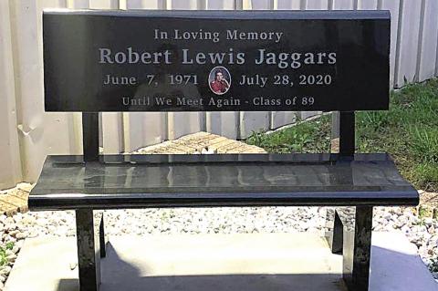 THE WETUMKA CLASS OF 1989 HAS PLACED A GRANITE BENCH AT THE HIGH SCHOOL GYMNASIUM