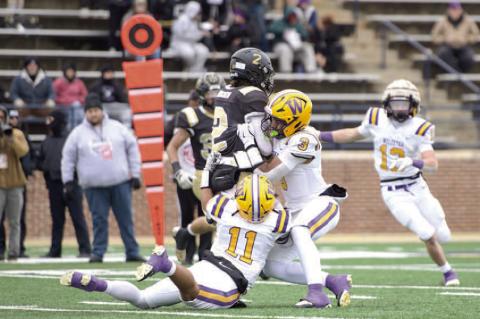 Noah Hare and Jakory Bagby combine for the tackle against Seiling.