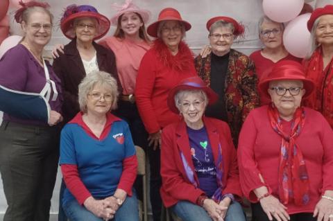Red Hatters Royally Entertained by the Young at Heart Group