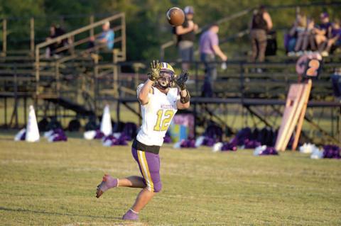 Paul Lowery catches a dart from Quarterback Isaiah Drake
