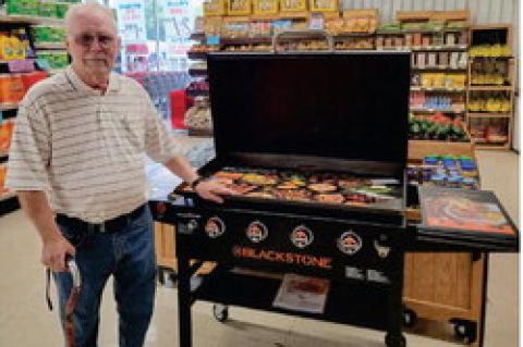 VERNON STOUT IS A WINNER! Vernon was the proud winner of the Super C Grill! Photo courtesy of Stormy Ramsey