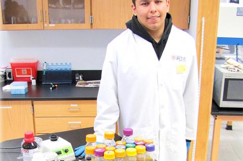 Dustin Biomed student, LeBryant Pigeon, studies Bee propolis for capstone project