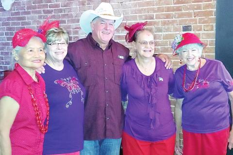Red Hatters enjoy outing to Ole Red’s