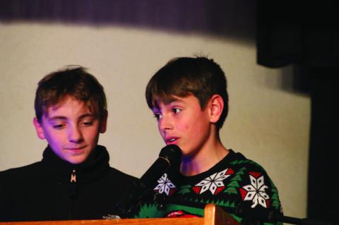 Calvin STUCO and Principal Lead Students in Christmas Program