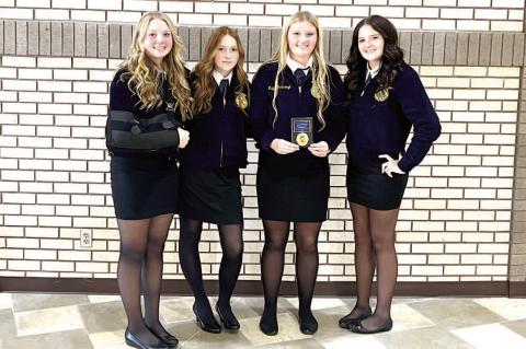 MOSS FRESHMEN FFA MEMBERS COMPETE AT REGIONAL GREENHAND QUIZ... The Moss FFA Chapter compet - ed at the Regional Greenhand Quiz on Tuesday, October 14th. Faith Yarbrough placed 5th Overall. Pictured left to right - Moss FFA Members Graclee Huff, Cennly Sn