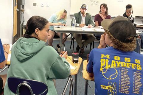 Pictured above: Moss Academic Team mem- bers pictured above (left to right): Competitors - Jacob Gentry, Landon Golden, Tara Keesee, Tate Keesee. Moss Academic Team member Joanna Cellars pictured as scorekeeper and Moss Science and English teachers, Mr. K