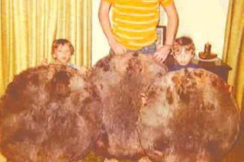 Mike and the boys with pelts.