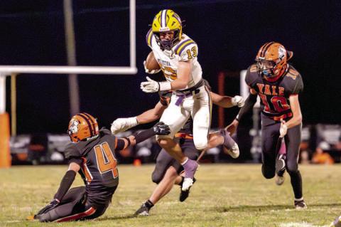 Senior running back and wide receiver, Bryant Sites, who is having another banner season, breaks three tackles to punch through the defense.