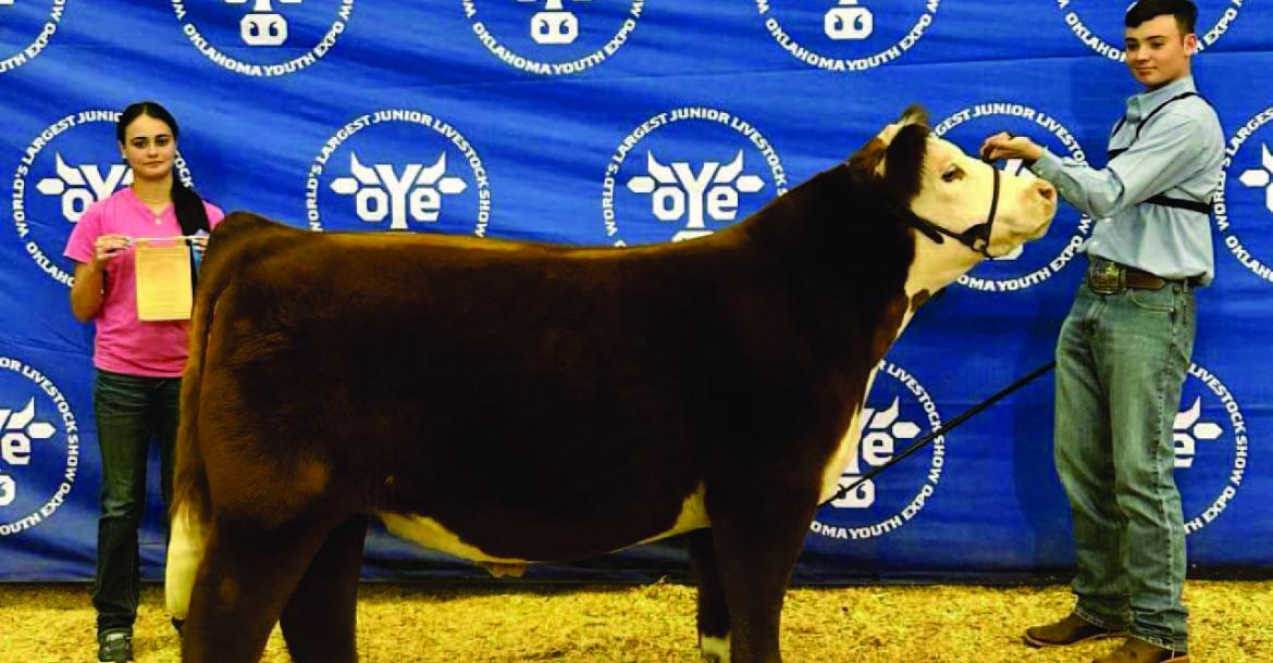 MOSS FFA MEMBER, LATHAN ROGERS, EARNED 1ST IN CLASS AND 3RD OVERALL HEREFORD STEER AT THE OKLAHOMA YOUTH EXPO. Lathan’s steer was an OYE sale qualifier and was purchased by Devon Energy. Pictured above: Tara Keesee (left) and Lathan Rogers (right) Photo Courtesy of Whitney Purkins