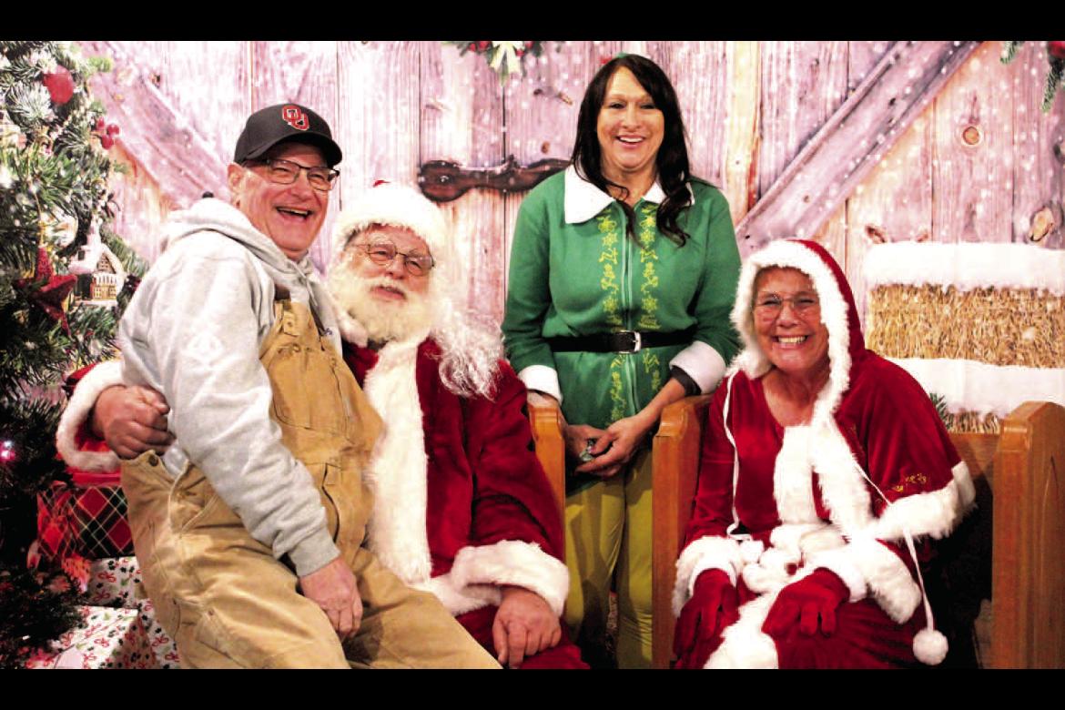 NEVER TOO OLD TO BELIEVE IN SANTA... Robert Carlton just shared his wish list with Santa. Santa was happy to see that Mr. Carlton is also an Oklahoma Sooner fan. Picture by Felisha Ring
